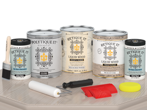 Retique It® Wood'n Finish Kit in Gloss, large size, shown on a wooden table, includes tools and sample finish for furniture restoration.
