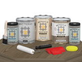 Retique It® Wood'n Kit in Weathered Wood, large size, with matte finish on a table, designed for exterior wood top coating.