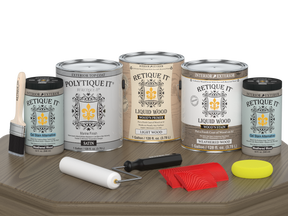 Retique It® Wood'n Finish Kit with four weathered wood exterior top coats, satin finish, shown on a table surface.