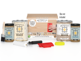 Retique It® Wood'n Finish Kit in white oak with four large bottles, designed for multi-purpose wood finishing projects.