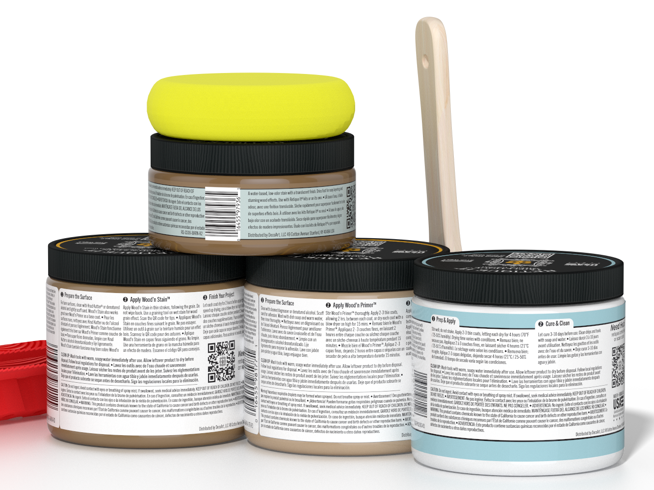 Five paint cans with lids stacked on a white background