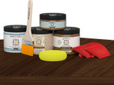 Dark oak countertop kit by Retique It® for kitchen island, featuring stain application on a wooden surface.