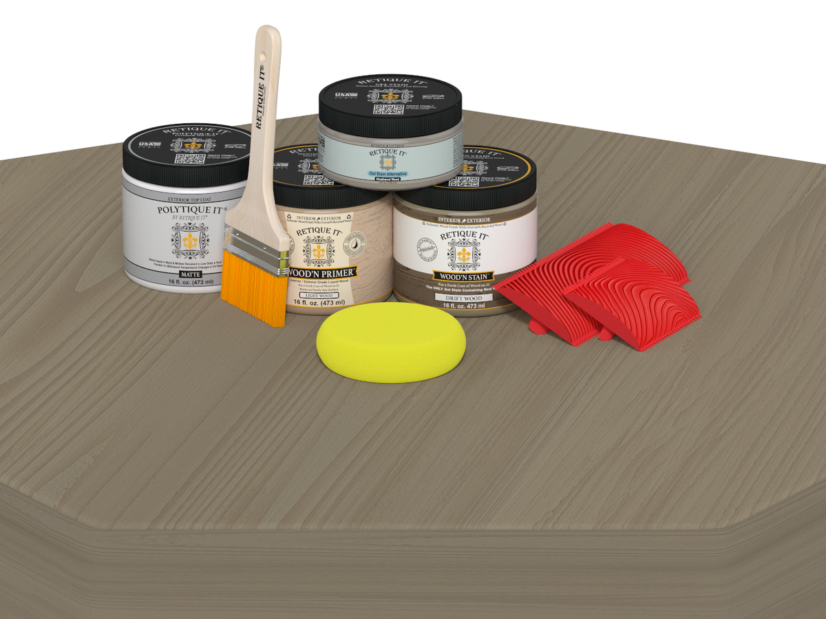 Painting supplies including cans, brushes, and a sponge on a wooden surface.