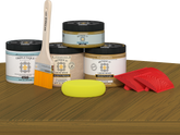 Retique It® Wood'n Finish Kit in Old Oak stain, double size, displayed on a table, showcasing wood stain application.
