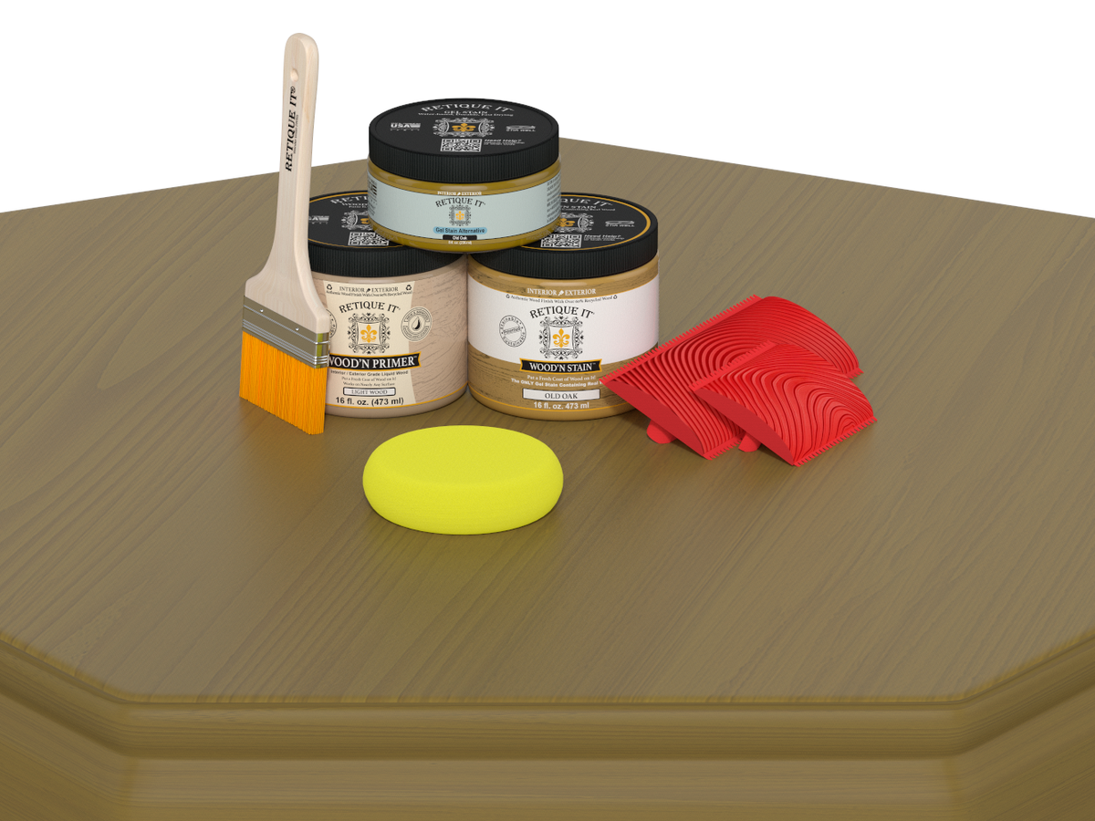 Painting supplies including jars, a brush, a sponge, and red tools on a wooden surface.