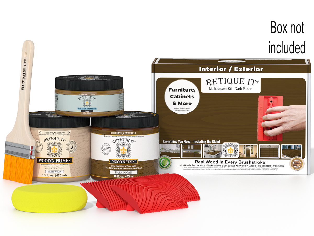 Retique It furniture painting kit with paint cans, brush, sponge, and packaging on a white background