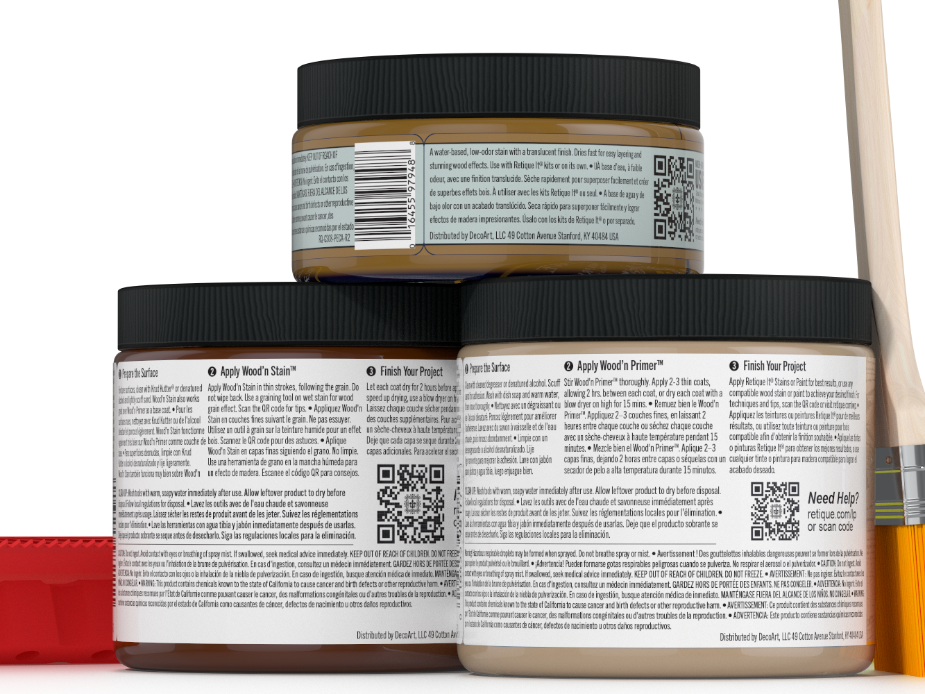 Three jars of wood finish product with labels and a brush on a white background