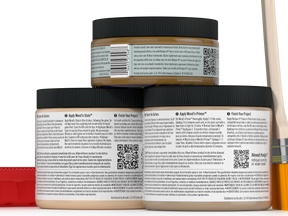 Three jars of wood finish product with labels and a paintbrush on a white background