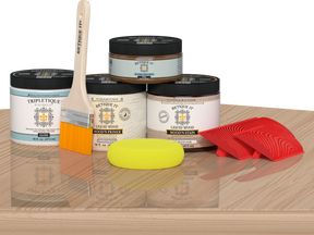Retique It® Wood'n Finish Kit in White Oak, double-sized stain set displayed on a table with wood finish samples.