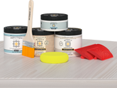 Retique It® white wash countertop kit for kitchen islands, featuring stain application on a modern white wash surface.