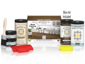 Retique It® Wood'n Finish Kit with four large black walnut stain bottles on a table, showcasing wood stain application.