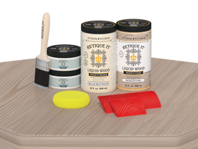 Retique It® Wood'n Cabinet Kit with 12 sun-bleached grained wood finish doors on a table surface.