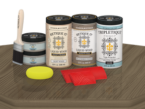 Retique It® Wood'n Finish Kit with four large weathered wood stains, gloss finish on a tabletop wood surface.