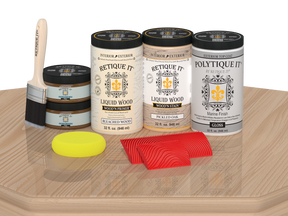 Retique It® Wood'n Finish double front door kit in White Oak stain with glossy finish, displayed on a table.