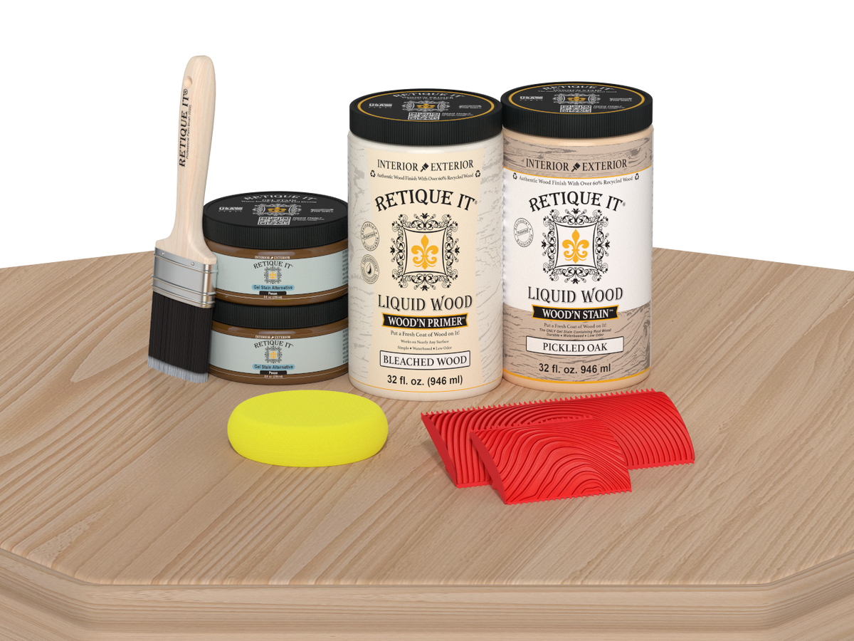Retique It® Wood'n Cabinet Kit with 12 white oak grained door stains, displayed on a table, showcasing natural wood grain finish.