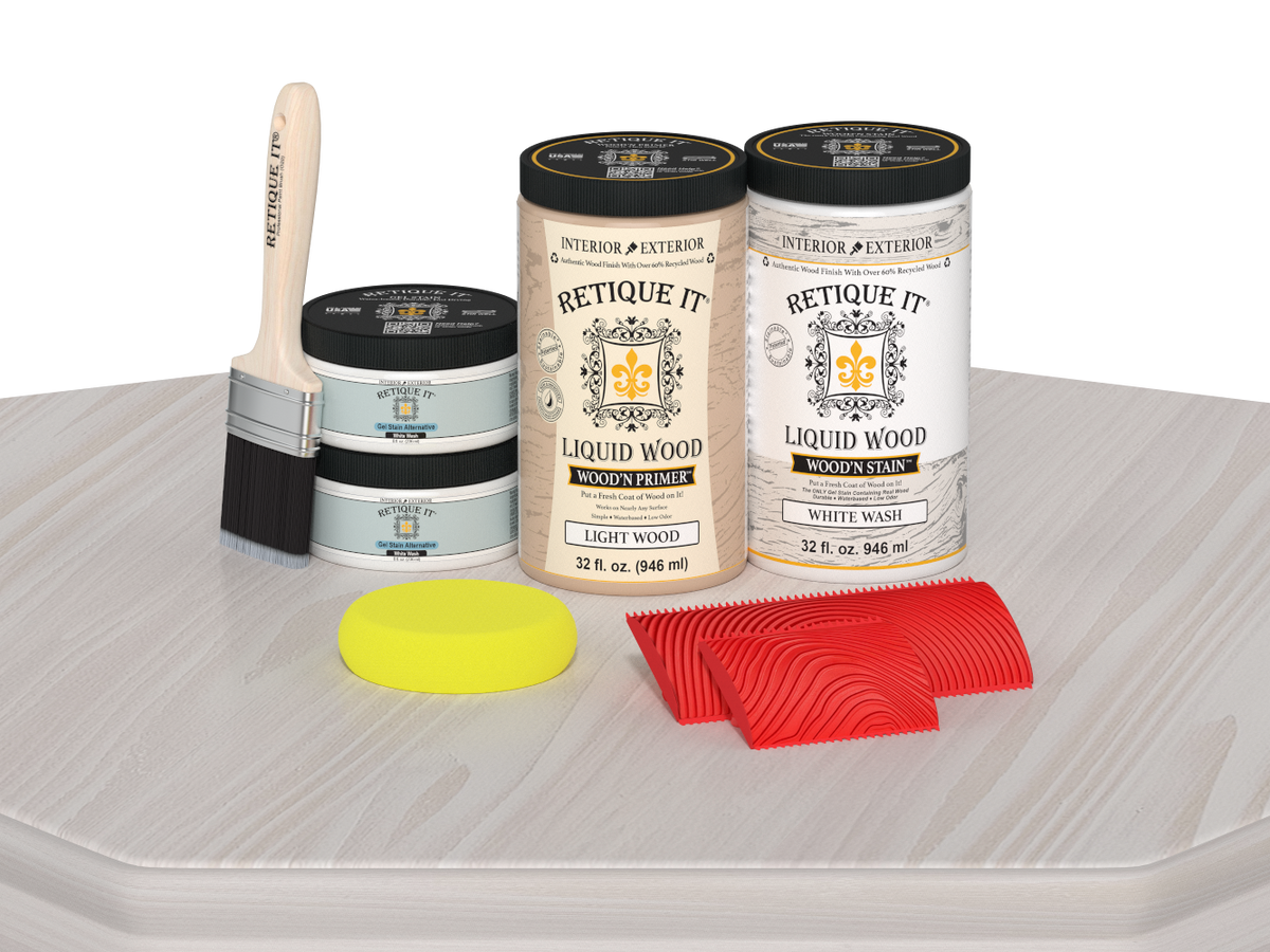 Retique It® Wood'n Cabinet Kit with 12 white wash grained door stains, displayed on a table showing wood grain detail.