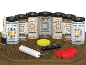 Retique It Wood'n Cabinet Kit with barn wood grain stain, 24-door cabinet kit, glossy finish on a table.