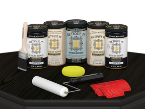 Retique It Wood'n Cabinet Kit with 24 grained cabinet doors in classic black stain, displayed on a table.