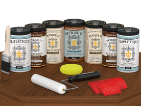 Retique It® Wood'n Cabinet Kit in Vintage Cherry stain, satin finish, featuring 24 grained cabinet doors on a table.