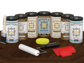 Retique It® Wood'n Cabinet Kit in Dark Oak stain, matte finish, with 24 grained cabinet doors displayed on a table.