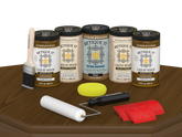Retique It® Wood'n Cabinet Kit in Dark Pecan stain, includes 24 grained wood cabinet doors displayed on a table.