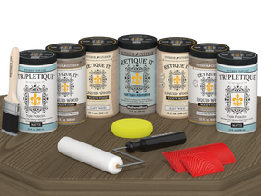 Retique It® Wood'n Cabinet Kit with weathered wood stain, 24 grained cabinet doors, matte finish, shown on table.
