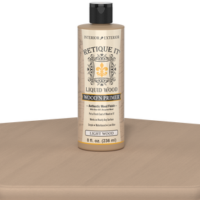 Liquid Wood Wood'n Primer by Retique It in light wood color, 8 oz bottle, used as a primer for wood surfaces.