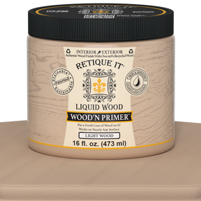 Retique It Liquid Wood Wood'n Primer in light wood finish, 16 fl oz, shown on a table for wood furniture prep and finishing.