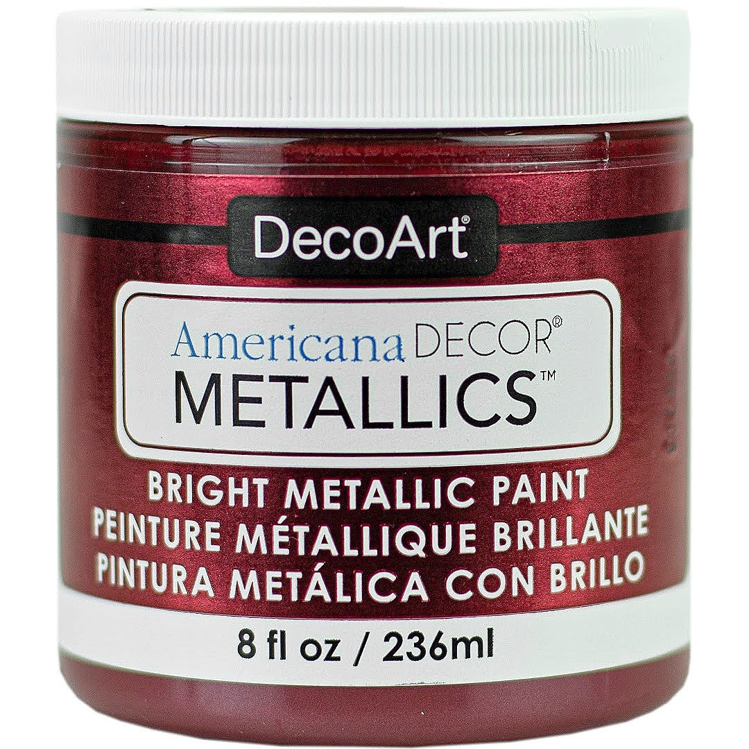 8 oz bottle of DecoArt Americana Decor Metallics pearl finish paint showing the metallic silver color and label on the bottle