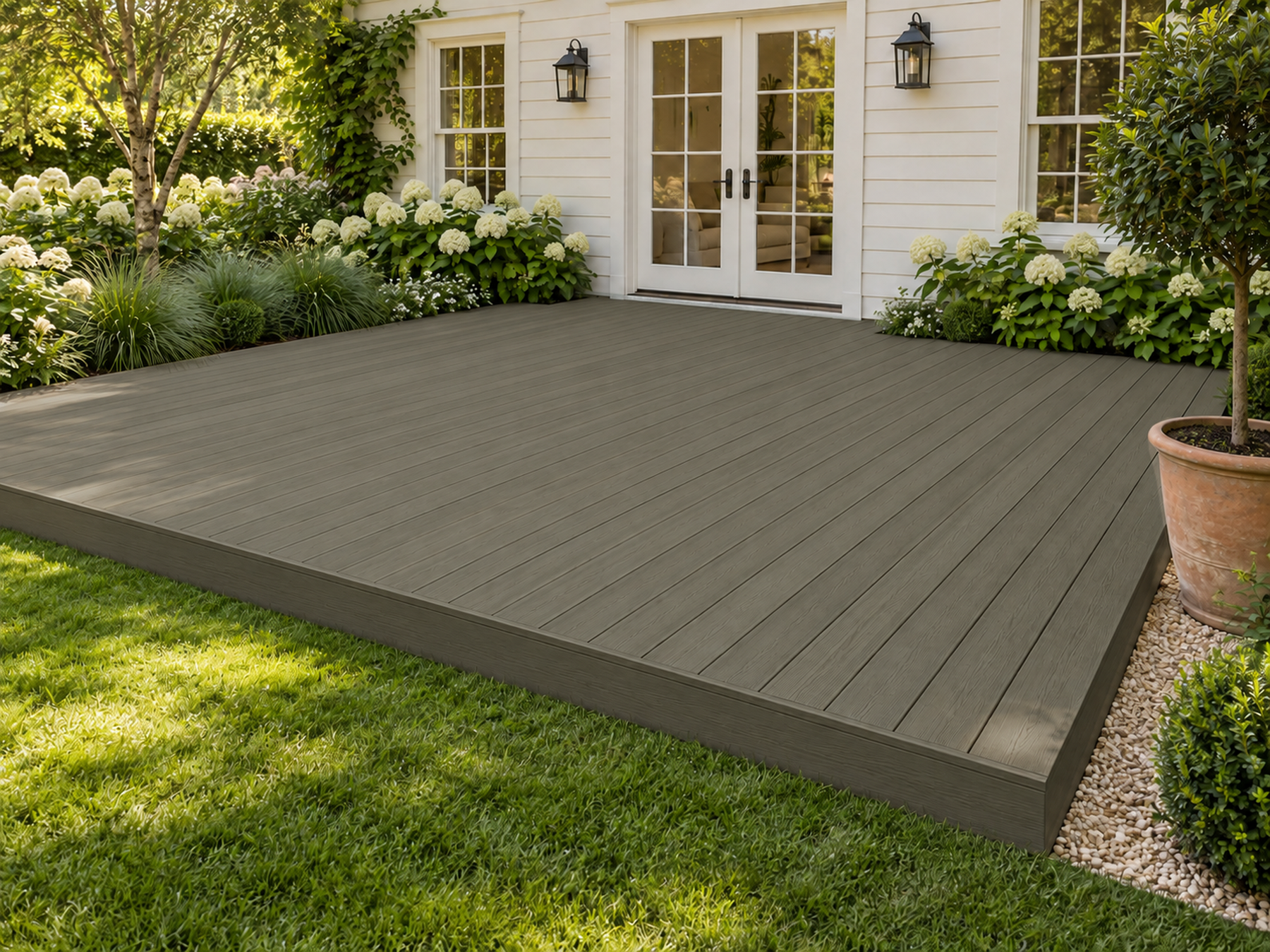 Weathered Wood Decking Wood'n Kit stain by Retique It showing a natural, textured weathered wood finish on a deck surface.