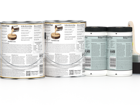 Three cans of wood finish product on a white background