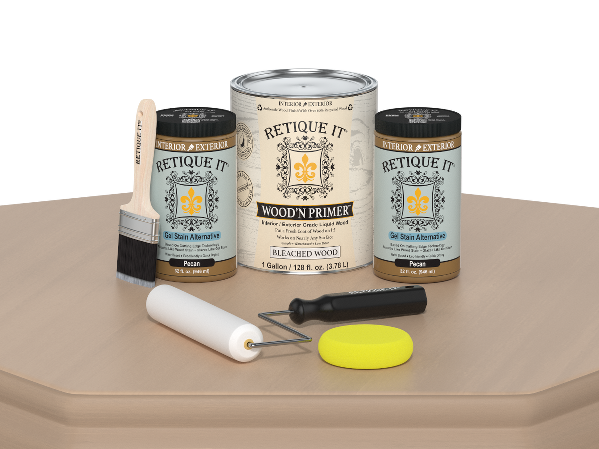 Retique It wood primer set with cans, brush, roller, and tools on a beige surface.