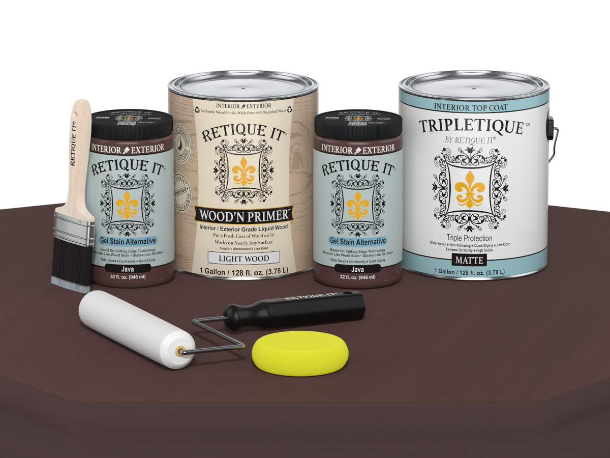 Collection of paint cans and painting tools on a brown surface