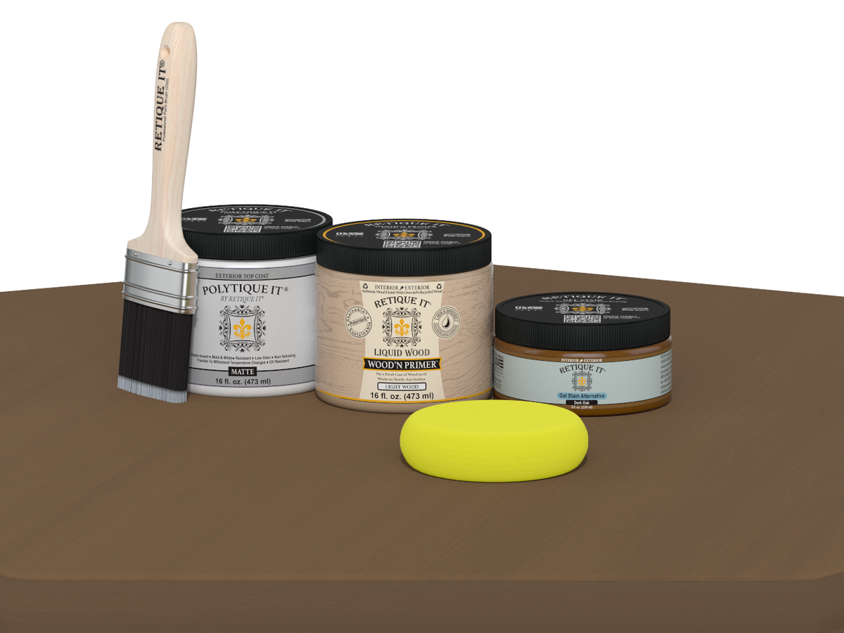Collection of paint-related products including jars, a brush, and a sponge on a brown surface.