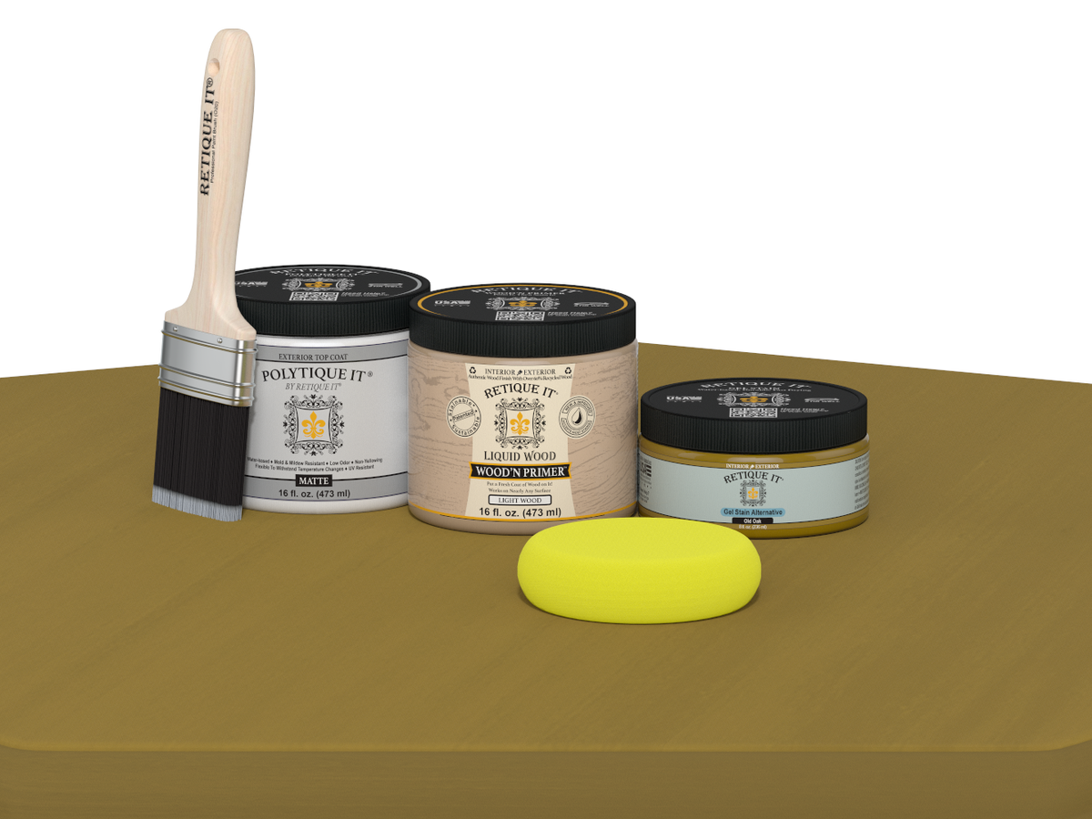Collection of paint-related products including a brush, jars, and a sponge on a beige surface.