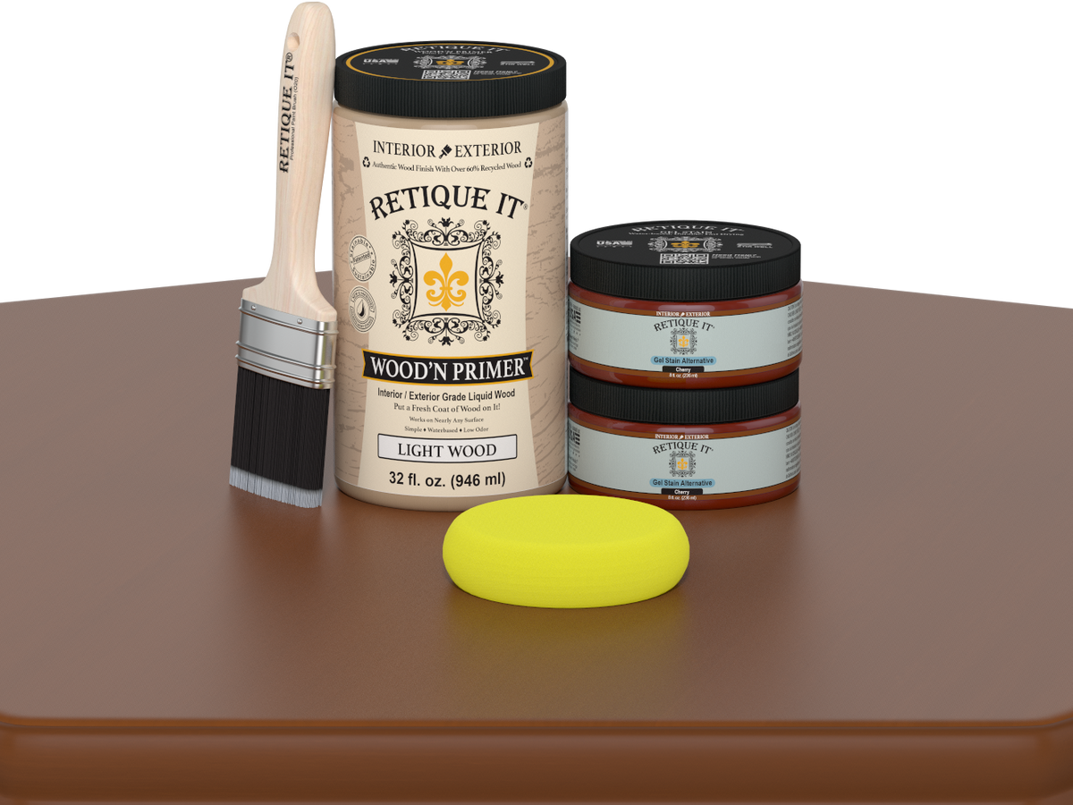 Retique It wood primer with a brush and sponge on a brown surface