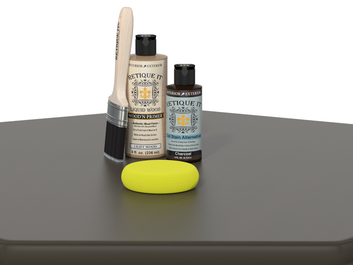 Set of painting supplies including a brush, bottles, and a sponge on a gray surface.