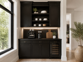 Black built-in coffee bar with open shelves, espresso machine, grinder, wine refrigerator, and white dishware.