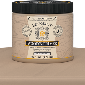 Liquid Wood Wood'n Primer by Retique It in Light Wood, 16 fl oz, showing a swatch of the primer on a surface.